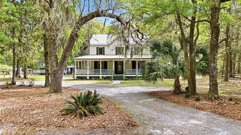 Set on 4.86 picturesque acres, this exceptional Lowcountry - Beach Home for sale in Johns Island, South Carolina on Beachhouse.com