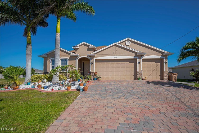 Welcome to this light and bright 4-bedroom 3 full bath home - Beach Home for sale in Cape Coral, Florida on Beachhouse.com