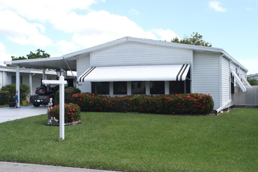 LAND OWNED -  Spacious & Open Floor Plan, this 2/2 has large - Beach Home for sale in Port Saint Lucie, Florida on Beachhouse.com