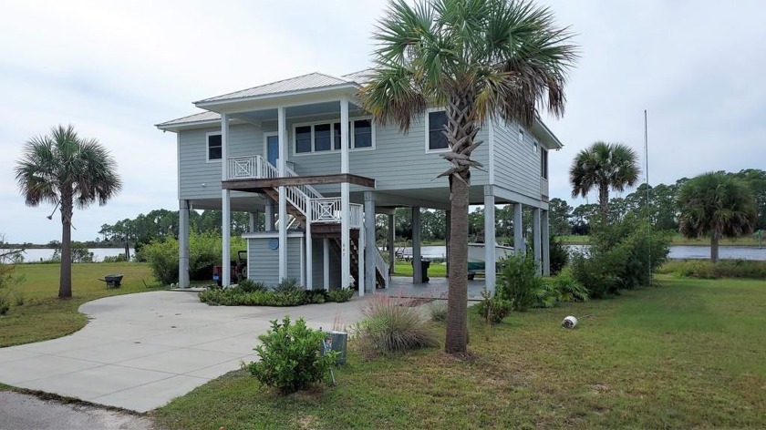 Location, Location,  Gated community. 3 bedroom, 2 bath home at - Beach Home for sale in Carabelle, Florida on Beachhouse.com