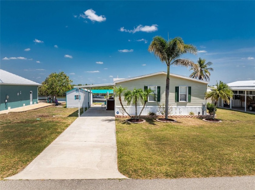 WATERFRONT 3 Bedroom, 2 Bathroom home with attached 2 car - Beach Home for sale in Punta Gorda, Florida on Beachhouse.com