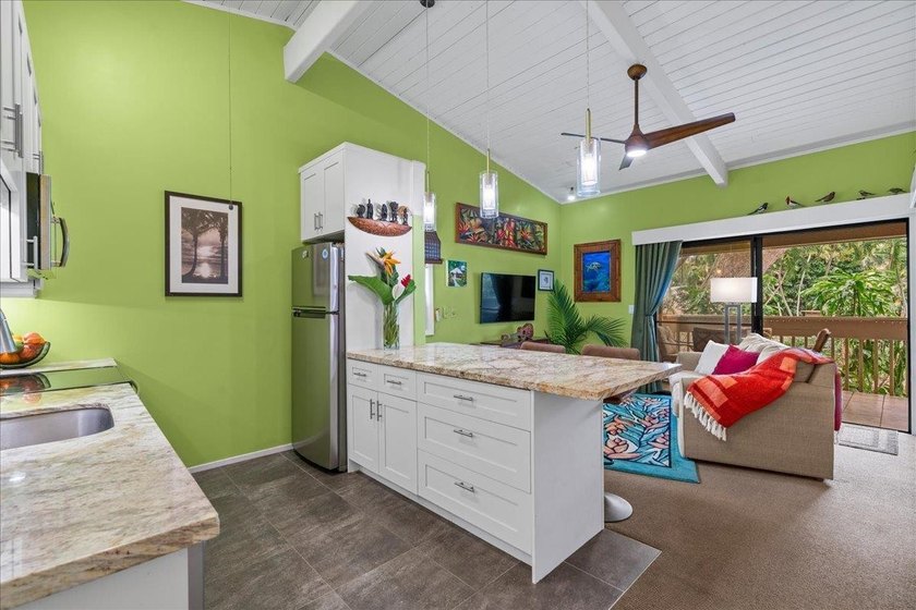 Nestled under the shade of a giant monkeypod tree, this south - Beach Condo for sale in Lahaina, Hawaii on Beachhouse.com