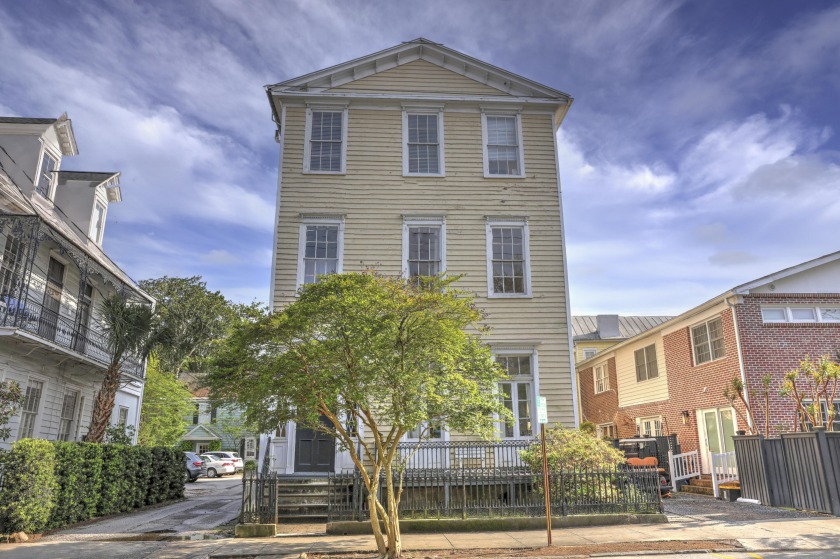 This lovely Charleston Single Side-hall style home is located in - Beach Home for sale in Charleston, South Carolina on Beachhouse.com