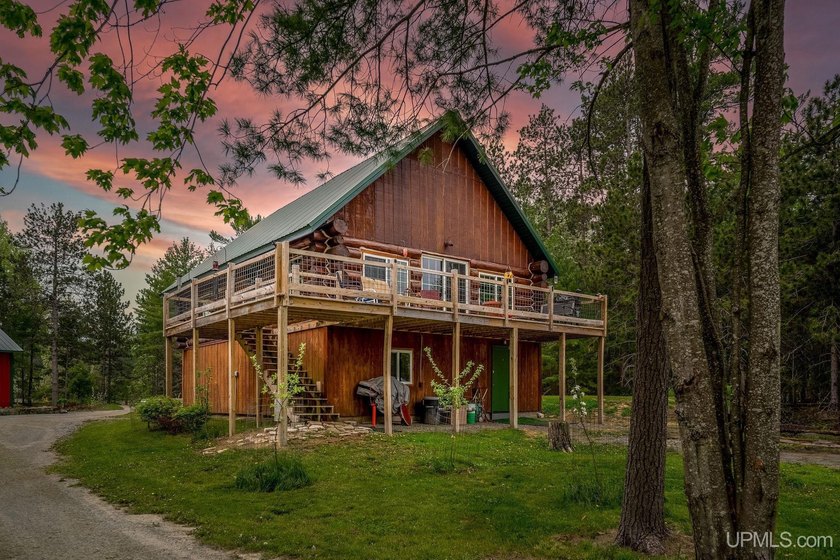 Rustic Elegance Meets Lakeside Living - Full Log Cabin on Moss - Beach Home for sale in Rapid River, Michigan on Beachhouse.com
