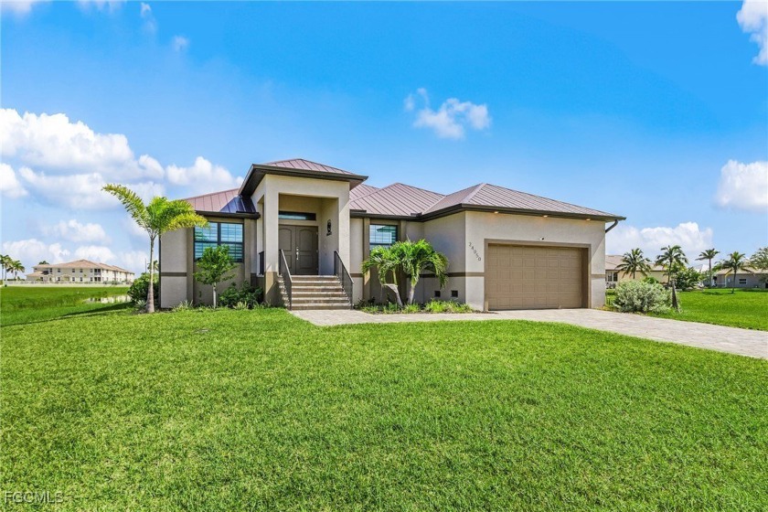 Come see this Beautifully designed heated pool home with an - Beach Home for sale in Punta Gorda, Florida on Beachhouse.com