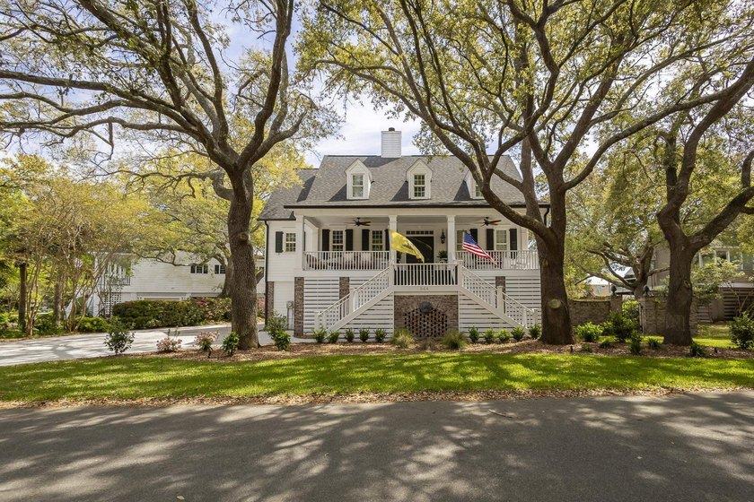 Beneath the canopy of four grand live oaks, this Mt. Gilead home - Beach Home for sale in Murrells Inlet, South Carolina on Beachhouse.com