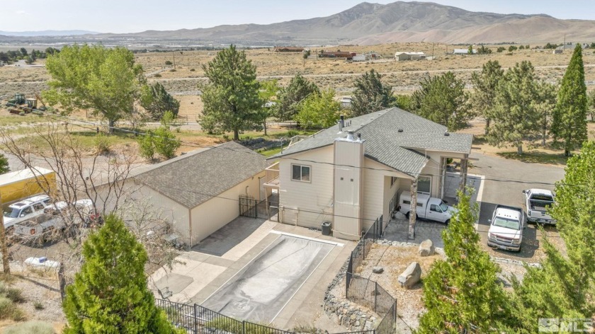 This stunning 5-bedroom, 3-bath home with a 4-car garage and RV - Beach Home for sale in Reno, Nevada on Beachhouse.com