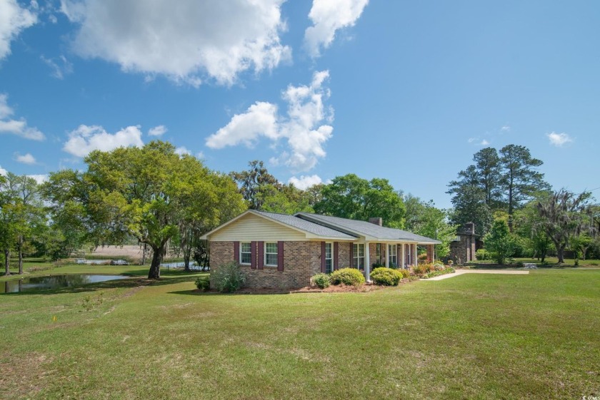 If you like the thought of walking outside, hopping on your boat - Beach Home for sale in Georgetown, South Carolina on Beachhouse.com