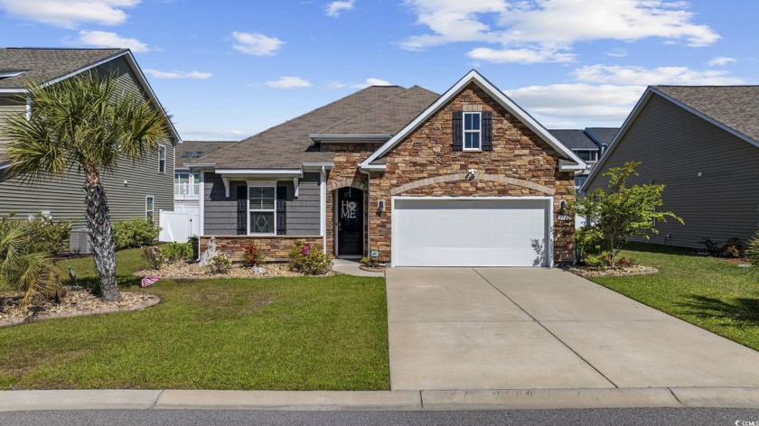 Welcome home to The Retreat at Ocean Commons! With an Acadia - Beach Home for sale in Surfside Beach, South Carolina on Beachhouse.com