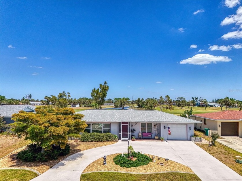 Golf Course Pool Home with Upgrades, Views, and Style! Looking - Beach Home for sale in Rotonda West, Florida on Beachhouse.com