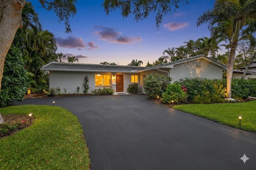 Ultimate Peace of Mind & Tropical Luxury in Boca Raton! This - Beach Home for sale in Boca Raton, Florida on Beachhouse.com