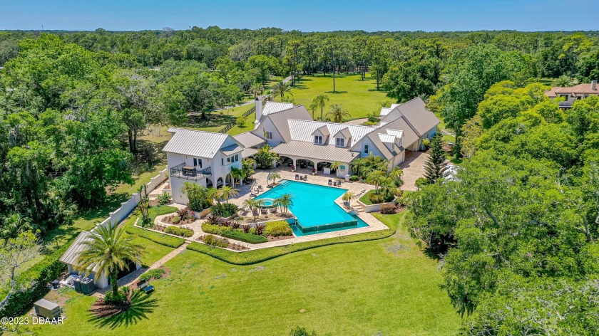 Welcome to this exquisite riverfront estate situated on the - Beach Home for sale in Ormond Beach, Florida on Beachhouse.com