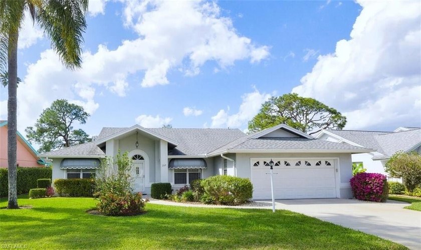 This spacious home with tremendous curb appeal is being sold - Beach Home for sale in Naples, Florida on Beachhouse.com