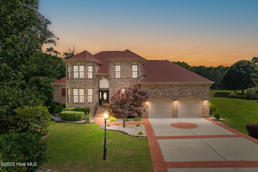This custom 4-bedroom, 2.5-bath brick home is a true gem - Beach Home for sale in Calabash, North Carolina on Beachhouse.com