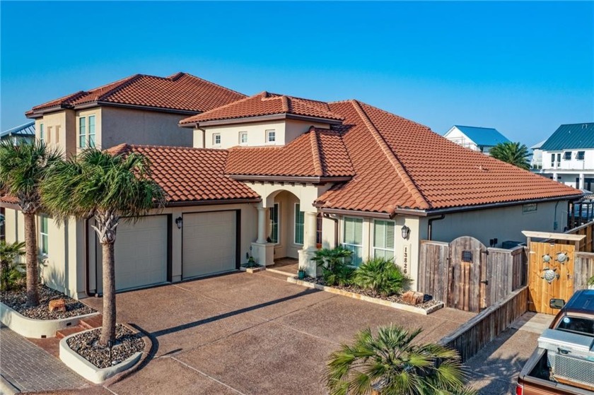 This WATERFRONT stunner sits in a GATED community on North Padre - Beach Home for sale in Corpus Christi, Texas on Beachhouse.com