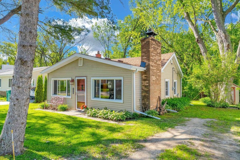 Welcome to your perfect getaway just two houses from beautiful - Beach Home for sale in Lexington, Michigan on Beachhouse.com