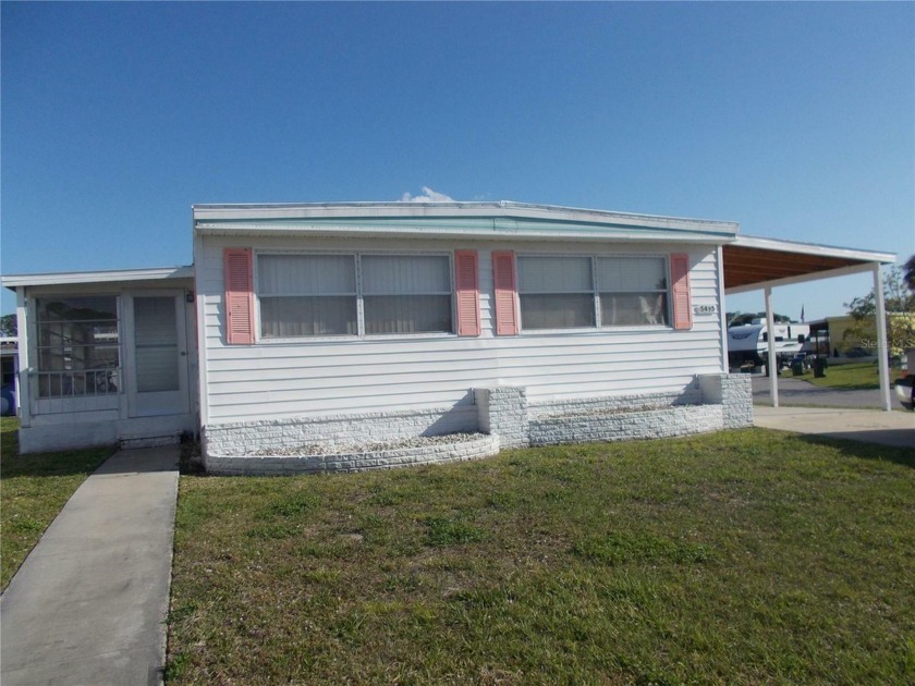 This is a partially furnished DOUBLEWIDE, 2 bedroom, 2 bath home - Beach Home for sale in North Port, Florida on Beachhouse.com