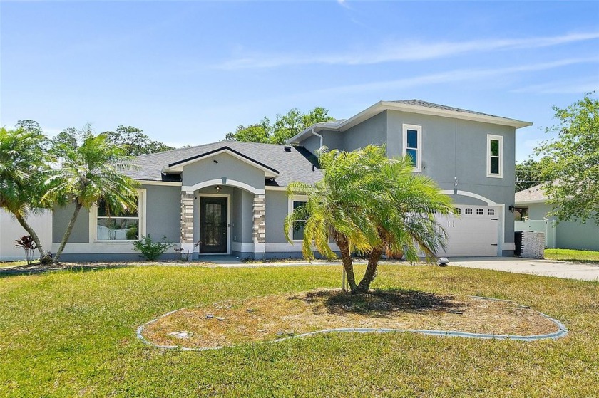 This lovely home is located in the very desirable Cypress Knoll - Beach Home for sale in Palm Coast, Florida on Beachhouse.com