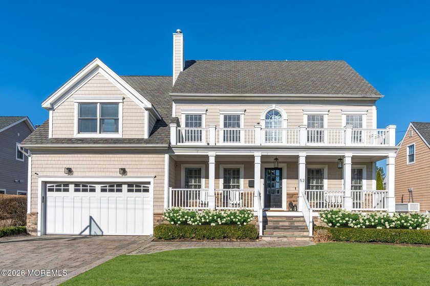 Designed for effortless coastal living, this timeless Monmouth - Beach Home for sale in Monmouth Beach, New Jersey on Beachhouse.com