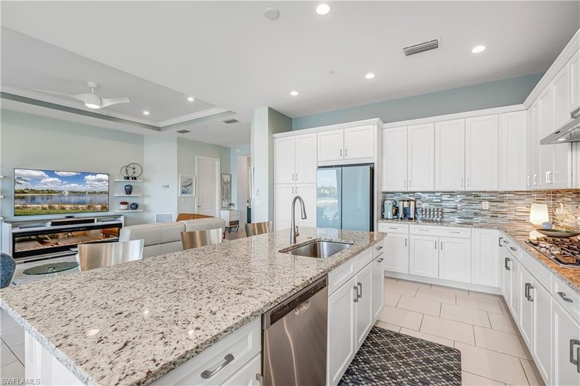 Experience refined lakefront living in this like-new 2-bedroom - Beach Condo for sale in Naples, Florida on Beachhouse.com