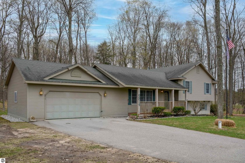 Discover peaceful living in a quiet subdivision just minutes - Beach Home for sale in Traverse City, Michigan on Beachhouse.com