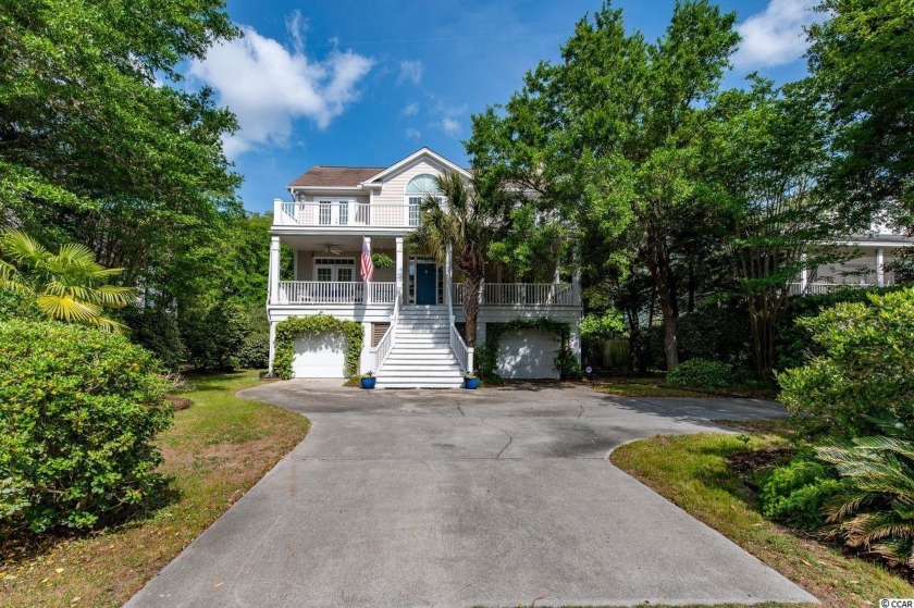 This classic home located at 37 Bobcat Drive is on a quiet dead - Beach Home for sale in Pawleys Island, South Carolina on Beachhouse.com