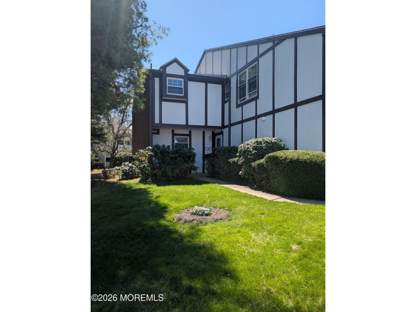 This warm and welcoming end unit offers sun-filled living room - Beach Townhome/Townhouse for sale in Spring Lake Heights, New Jersey on Beachhouse.com