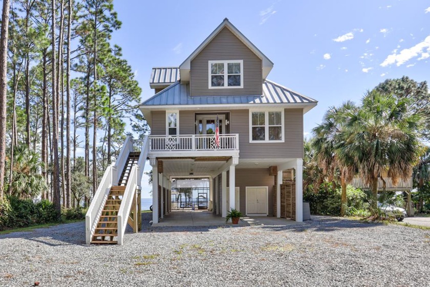 Beautiful, meticulously maintained water-front home with recent - Beach Home for sale in Carabelle, Florida on Beachhouse.com