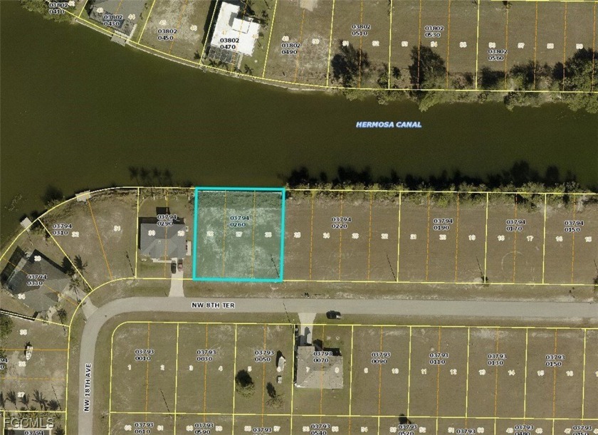 Prime Canal/Lakefront Lot in Cape Coral - Cleared and Ready to - Beach Lot for sale in Cape Coral, Florida on Beachhouse.com