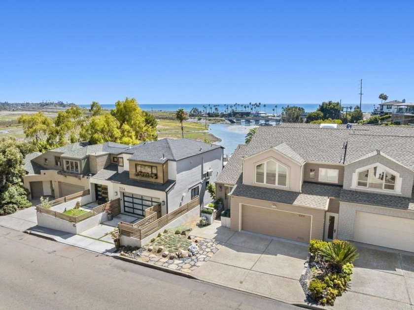 Sweeping white water ocean and the San Elijo Lagoon views, this - Beach Condo for sale in Cardiff by The Sea, California on Beachhouse.com