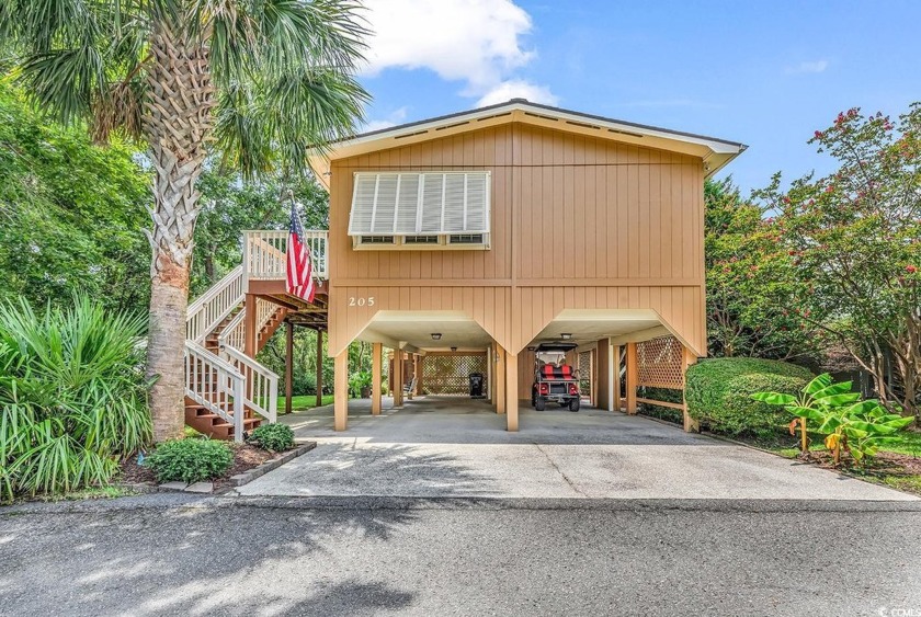 Located East of Highway 17 and just a stone's throw from the - Beach Home for sale in Surfside Beach, South Carolina on Beachhouse.com