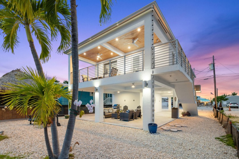 Own A Piece of Paradise! Exquisite waterfront turn-key CBS 3 - Beach Home for sale in Key Largo, Florida on Beachhouse.com