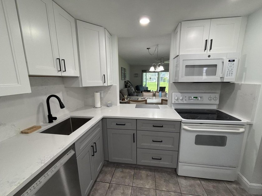 Enjoy life in this fully renovated ground floor condo featuring - Beach Condo for sale in Delray Beach, Florida on Beachhouse.com