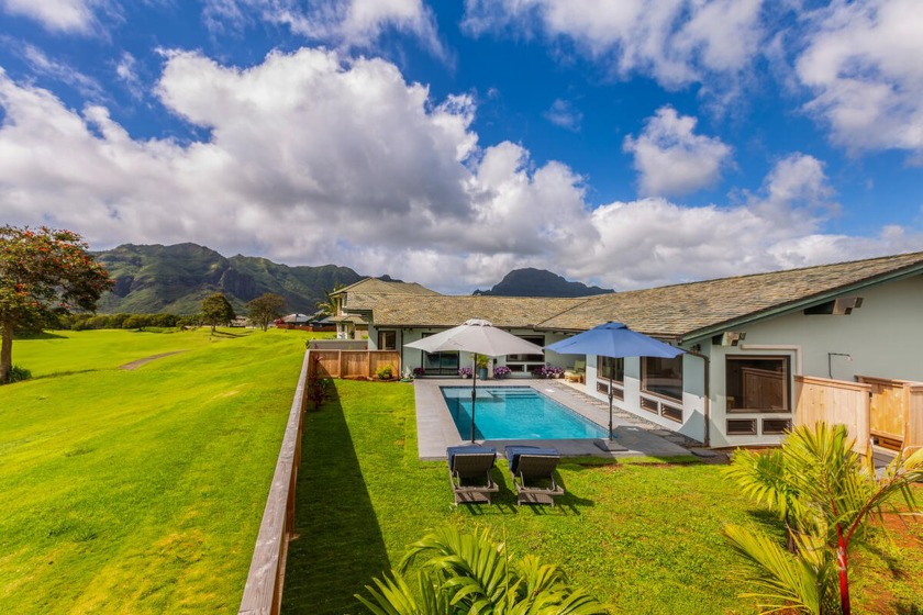 This newly renovated single level luxury home sits on the 18th - Beach Home for sale in Lihue, Hawaii on Beachhouse.com