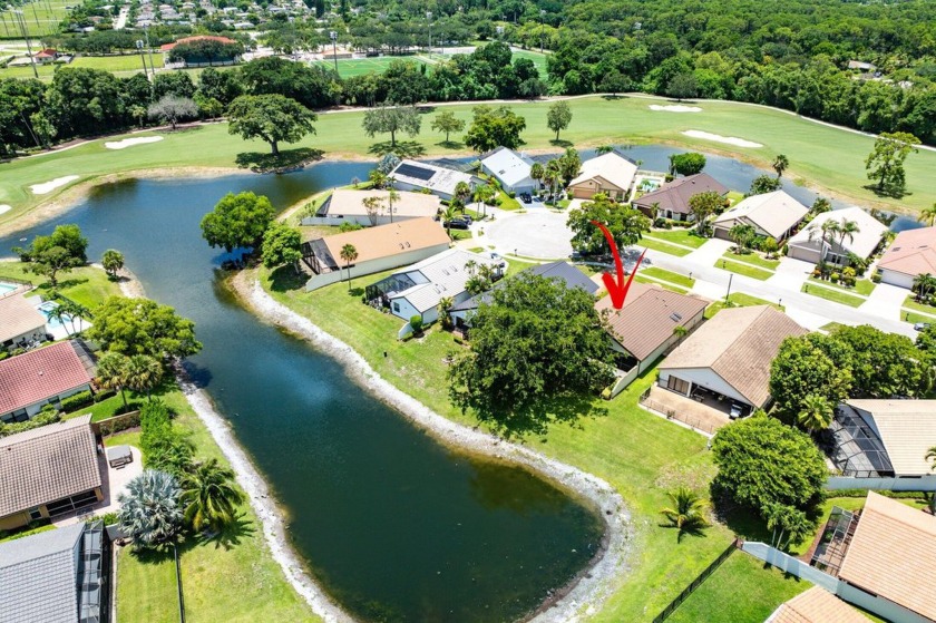 Located in the prestigious Boca Woods Country Club, this updated - Beach Home for sale in Boca Raton, Florida on Beachhouse.com