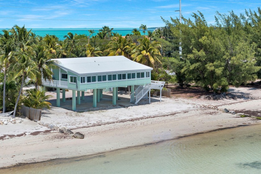 Beautiful oceanfront property with sandy walk-in beach for easy - Beach Home for sale in Lower Matecumbe Key, Florida on Beachhouse.com