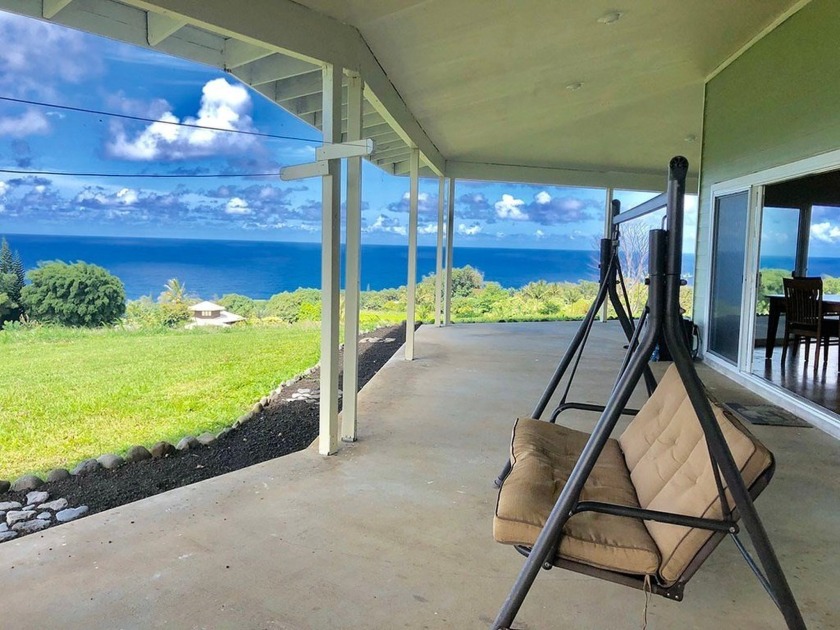 Nestled on nearly 3 acres of lush Hawaiian land, this 4 bedroom - Beach Home for sale in Ninole, Hawaii on Beachhouse.com