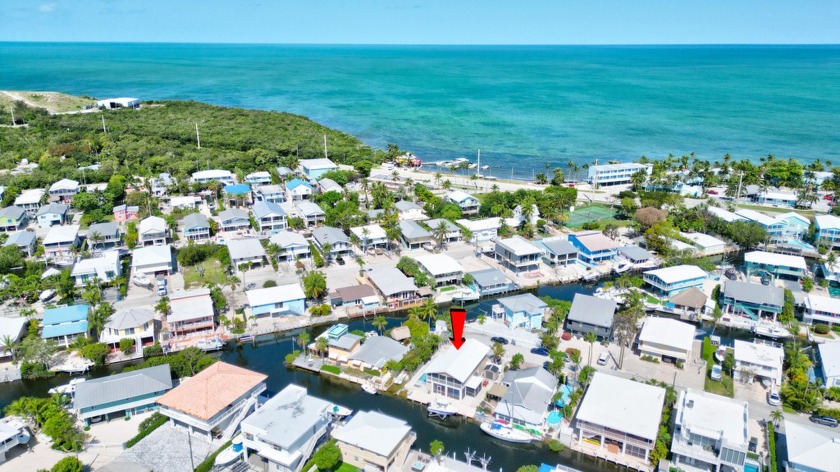This charming, stilted canal front home with 3Bed/2 Bath, plus - Beach Home for sale in Long Key, Florida on Beachhouse.com