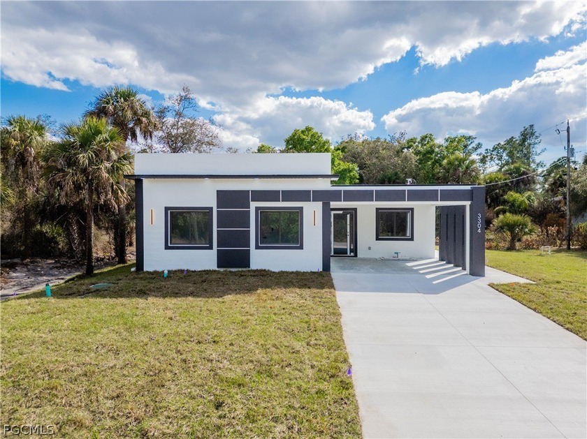 Step into this beautiful 3 bedroom, 2 bath home featuring 1200 - Beach Home for sale in Lehigh Acres, Florida on Beachhouse.com