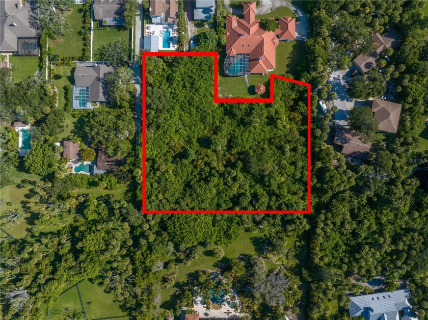 ONE OF A KIND LARGE 1.87 ACRE SECLUDED LOT, SITS BACK OFF OF - Beach Lot for sale in Largo, Florida on Beachhouse.com