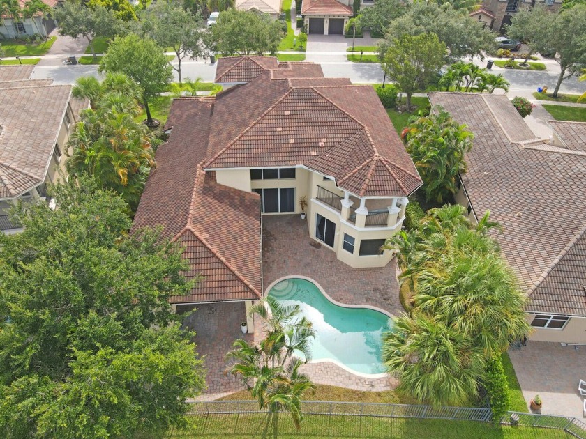 This dramatic home offers spectacular sunsets over the lake - Beach Home for sale in West Palm Beach, Florida on Beachhouse.com