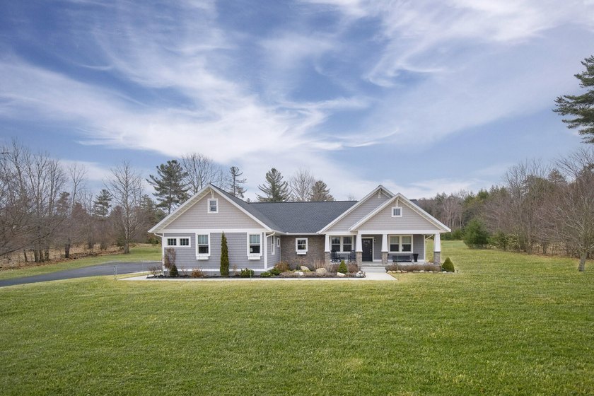 Welcome to Portage Ridge, where winding roads, mature trees and - Beach Home for sale in Onekama, Michigan on Beachhouse.com