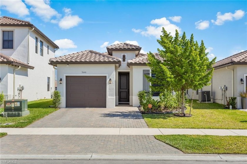 Welcome to this beautiful 2-bedroom + den, 2-bath home situated - Beach Home for sale in Ave Maria, Florida on Beachhouse.com