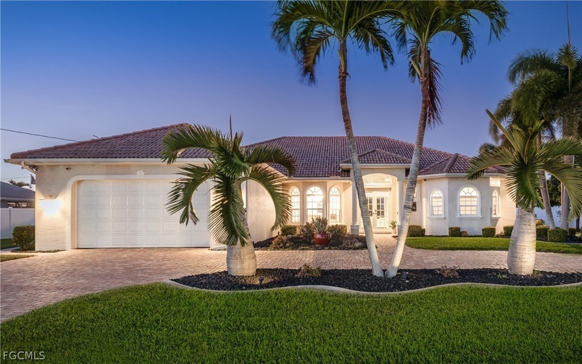 An exceptional custom waterfront estate set on an oversized - Beach Home for sale in Cape Coral, Florida on Beachhouse.com