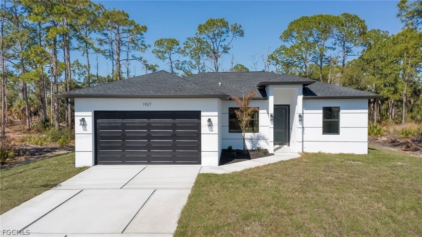 Welcome to this stunning new construction home in Lehigh Acres - Beach Home for sale in Lehigh Acres, Florida on Beachhouse.com