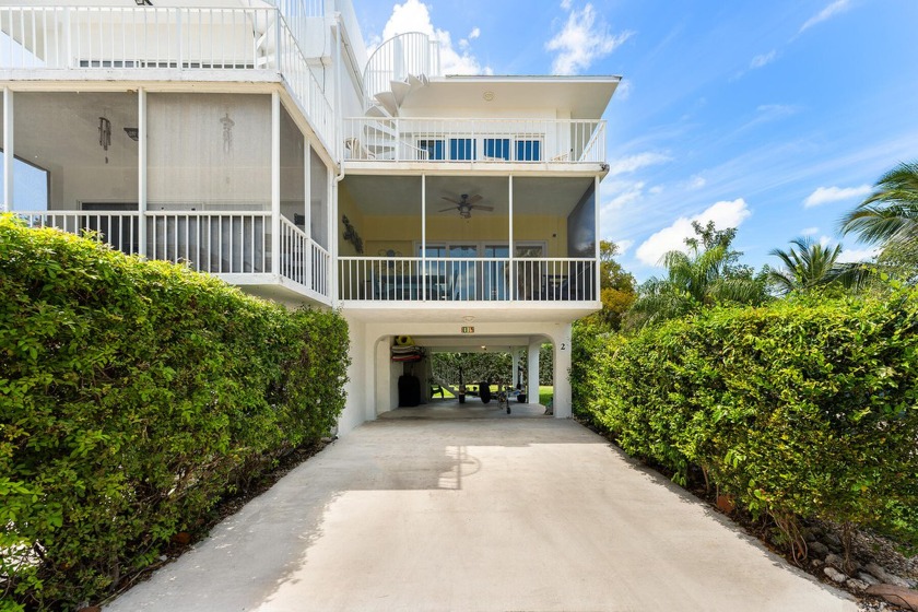 Nestled in an oceanfront complex, this meticulously updated - Beach Home for sale in Plantation Key, Florida on Beachhouse.com