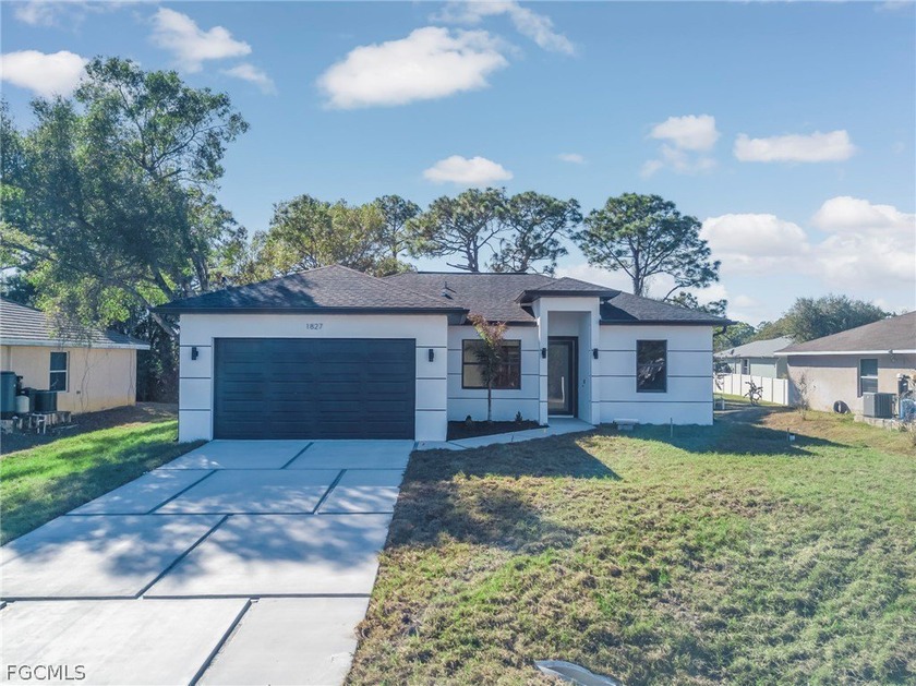 Welcome to this stunning new construction home in Lehigh Acres - Beach Home for sale in Lehigh Acres, Florida on Beachhouse.com