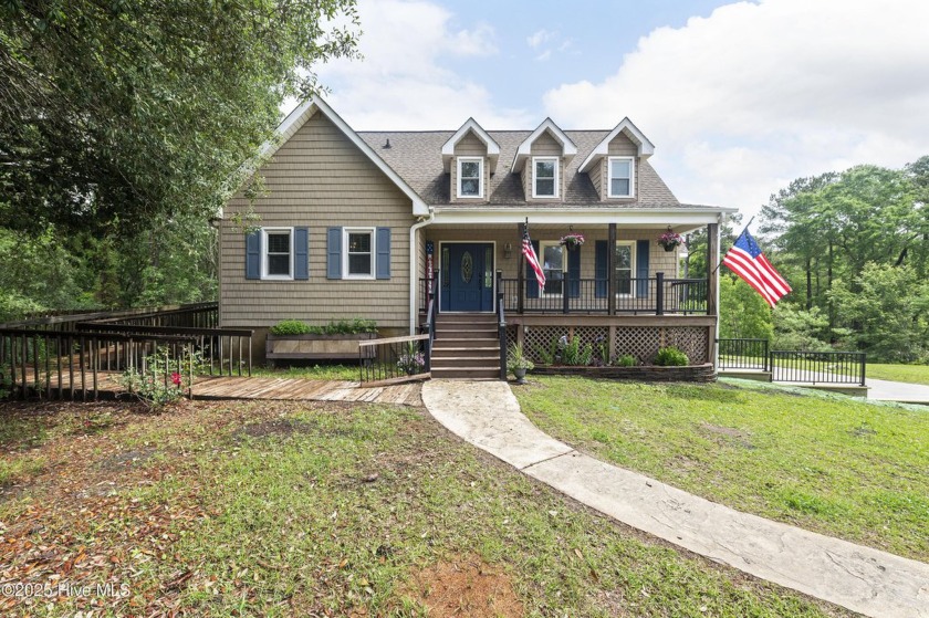 Nestled on 2.01 acres of lush, private land with no HOA, this - Beach Home for sale in Southport, North Carolina on Beachhouse.com