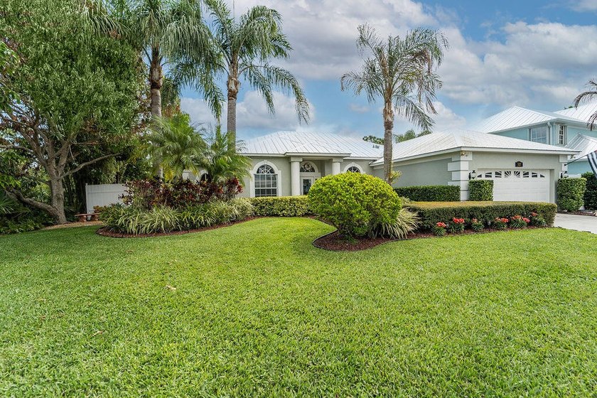 CONVENIENTLY LOCATED 4/3/2 W/OFFICE POOL HOME SITUATED ON A - Beach Home for sale in Jensen Beach, Florida on Beachhouse.com