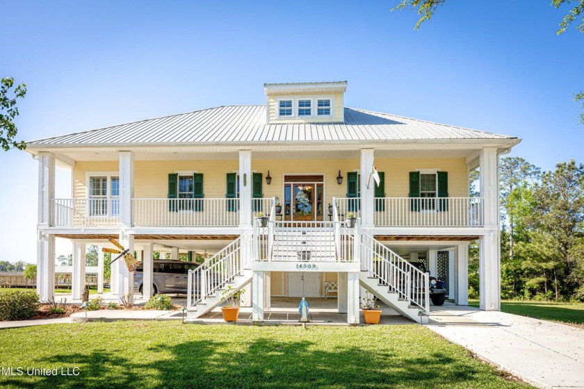 Welcome to this beautifully maintained elevated home on the - Beach Home for sale in Biloxi, Mississippi on Beachhouse.com
